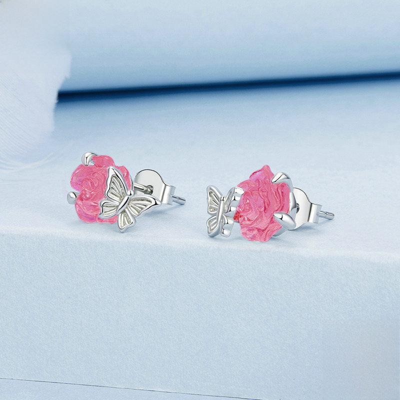 Aretes botón rosa con mariposa de plata 925 – Estilo Romántico