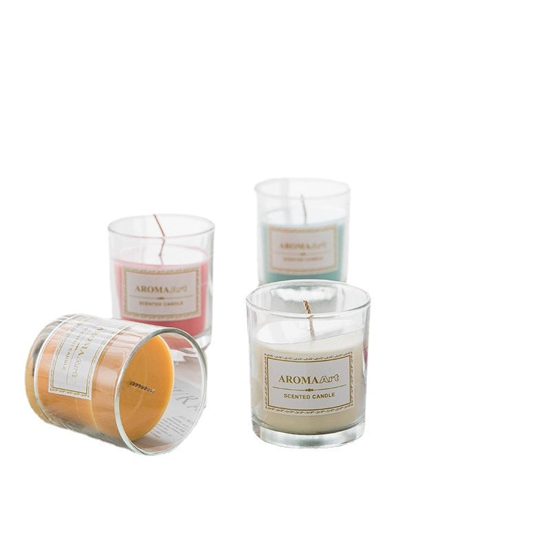 Vela aromática en vaso de cristal con fragancias relajantes para ambiente