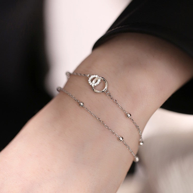 Pulsera de Plata 925 con Dos Círculos Enlazados – Conexión, Amistad y Amor