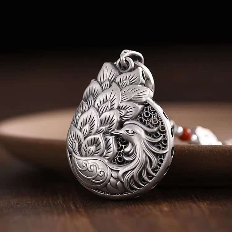 Colgante de pavo real vintage para mujer – símbolo de belleza y elegancia