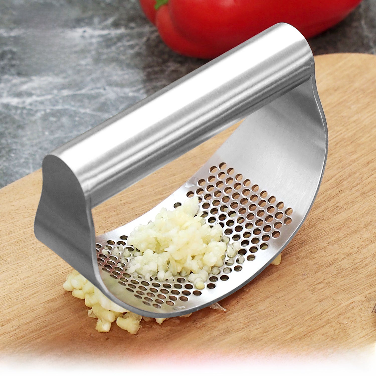 Triturador de ajo y jengibre en acero inoxidable grado alimenticio y ergonómico