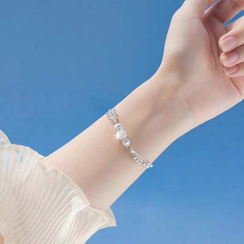 Pulsera Ajustable de Varios Hilos con Bolitas Metálicas – Estilo Elegante para Mujer