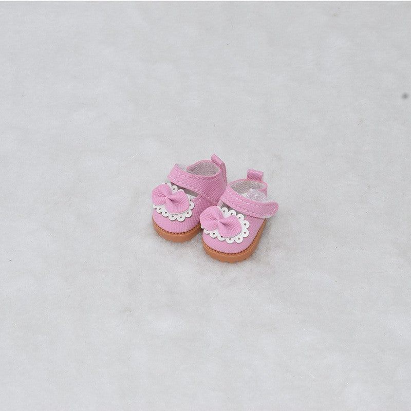 Zapatos rosados con lazo decorativo para muñecos Labubu de 17CM, accesorios ideales para juegos de vestir y colección infantil.