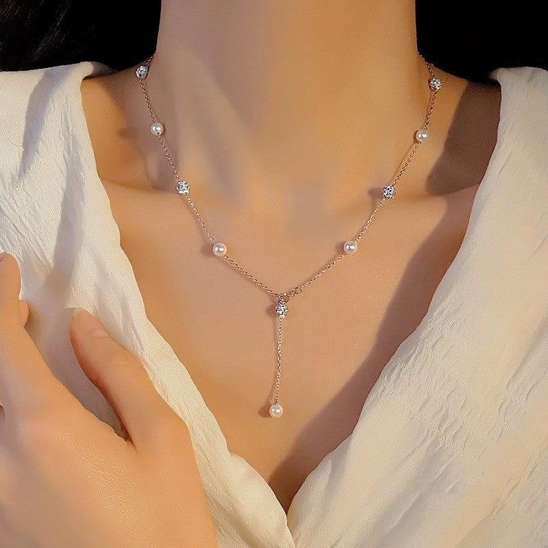 Collar de Clavícula en Plata S925 con Perlas y Zirconia – Diseño Versátil