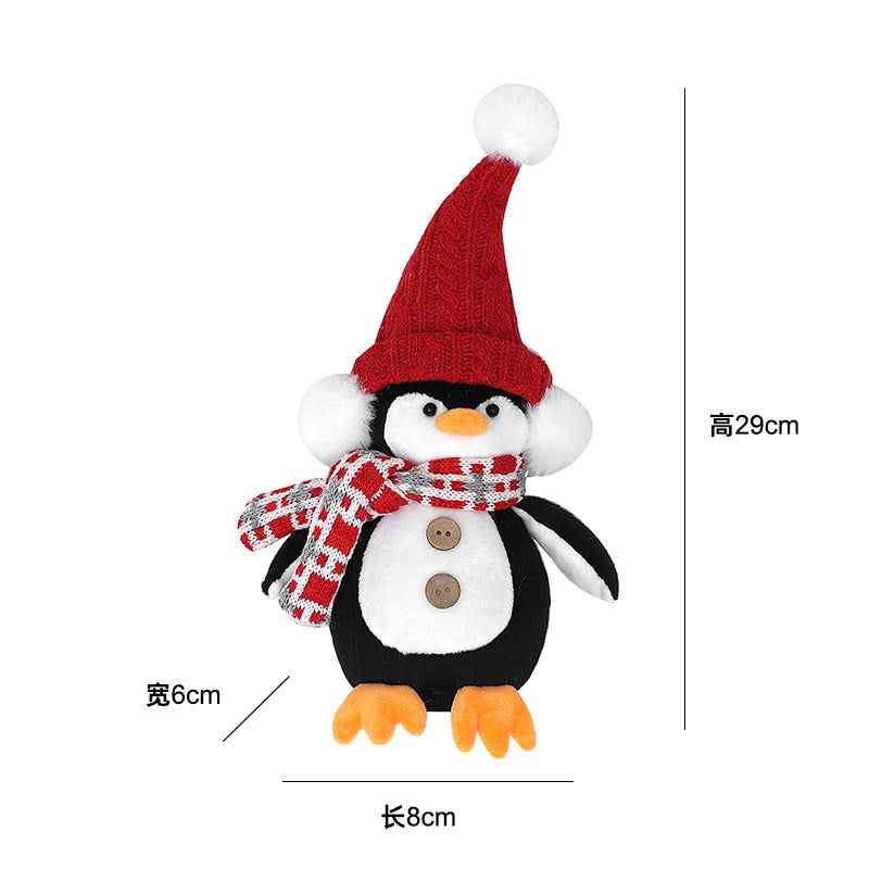 Pingüino navideño con bufanda y gorro