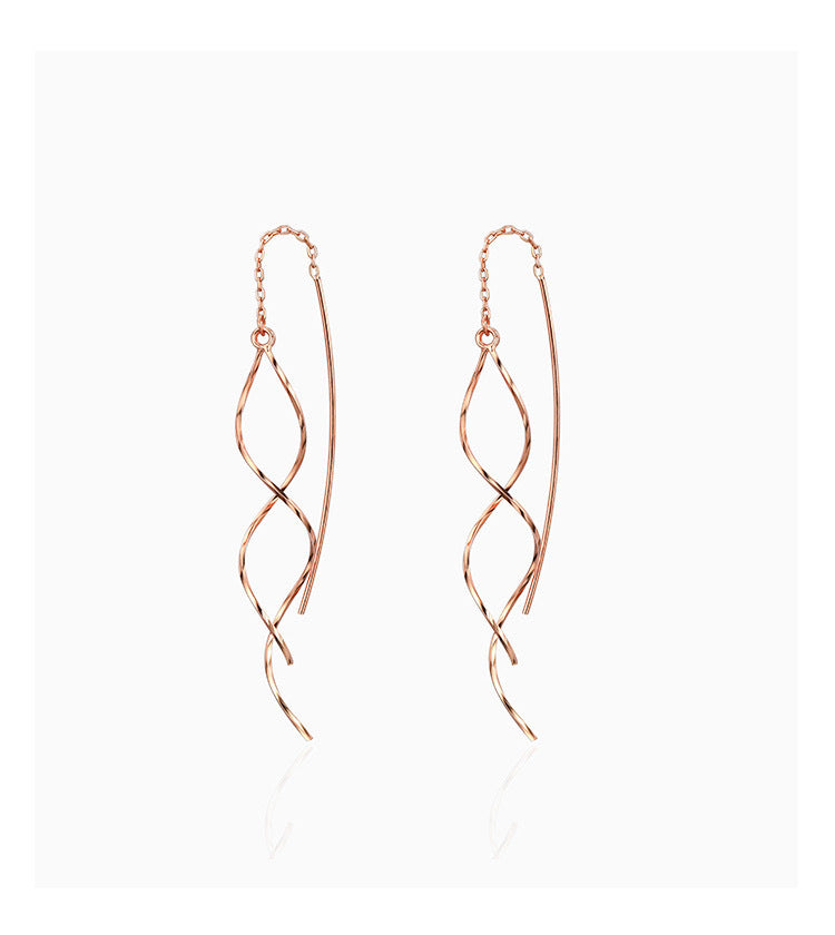 Aretes Largos de Mujer con Borlas Onduladas – Movimiento y Estilo para el Rostro