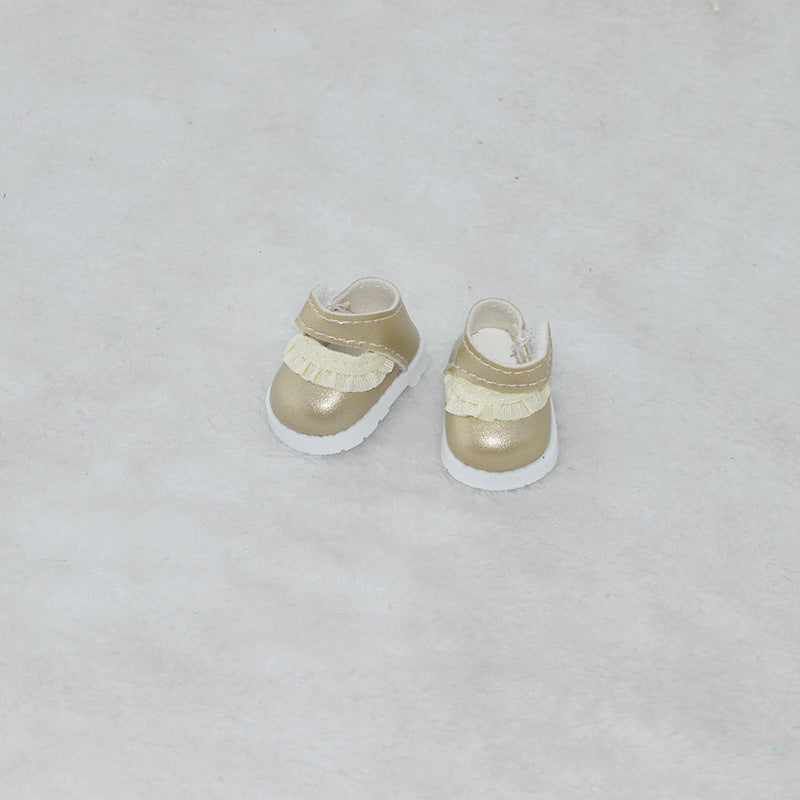 Zapatos dorados con flecos para muñecos Labubu de 17CM, ideales para complementar atuendos en juegos de vestir y colección.