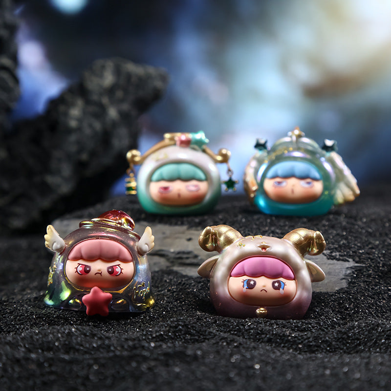 Caja sorpresa con figuras de signos zodiacales