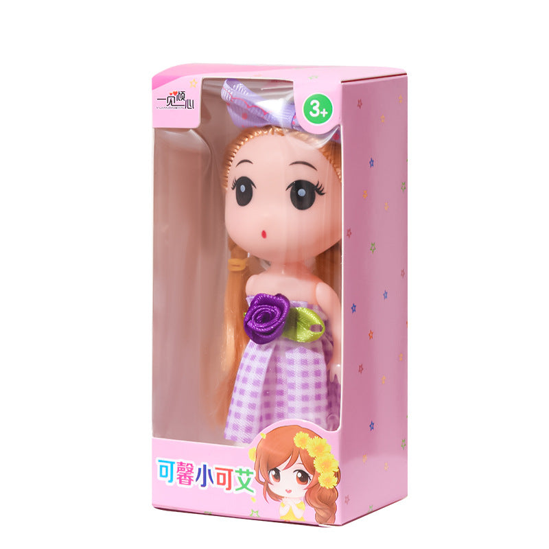 Muñeca llavero de 12 cm en caja sorpresa