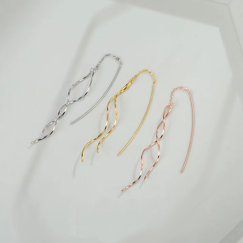 Aretes Largos de Mujer con Borlas Onduladas – Movimiento y Estilo para el Rostro