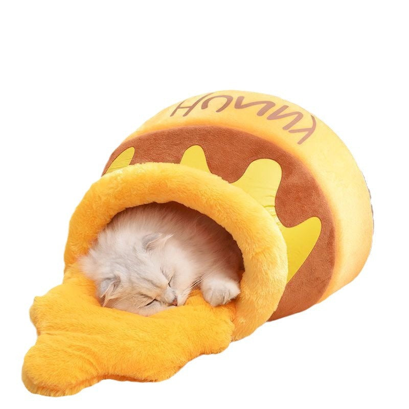 Cueva para gato con diseño de mielera en color amarillo, cama suave y acolchonada