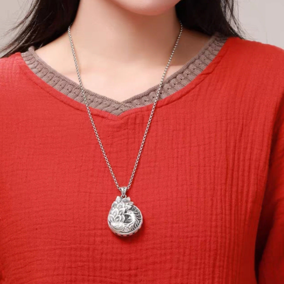 Colgante de pavo real vintage para mujer – símbolo de belleza y elegancia