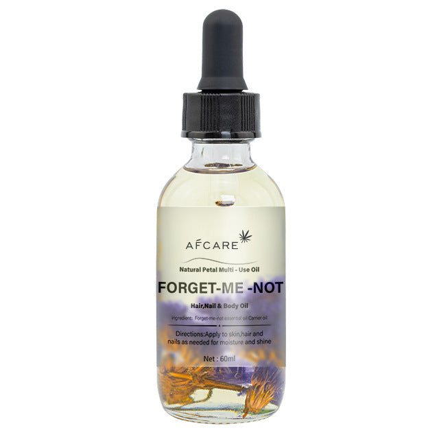 Aceite corporal con flores de nomeolvides, ideal para hidratación profunda y brillo natural en piel, cabello y uñas.
