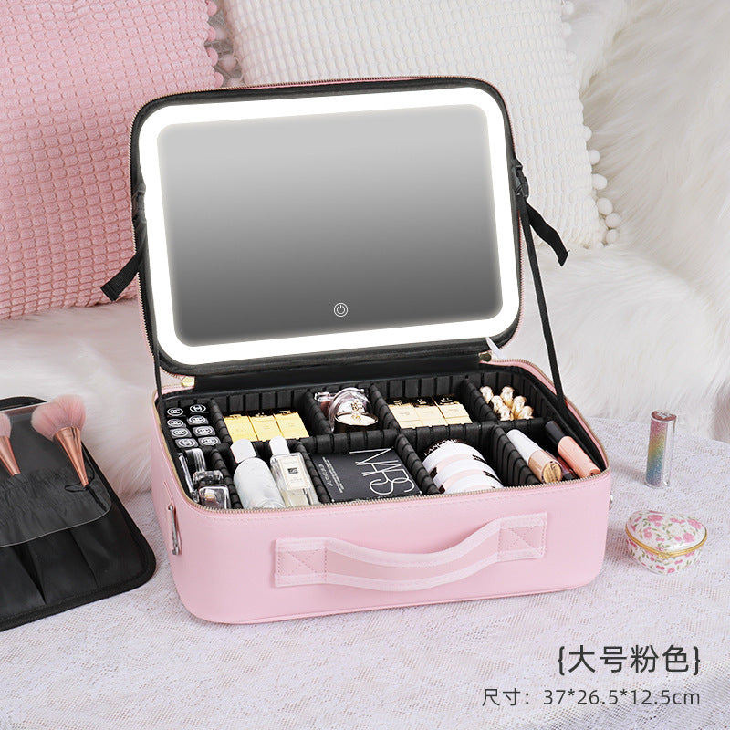 Neceser de maquillaje grande rosa con espejo iluminado y amplio espacio de almacenamiento. Ideal para viajes y uso profesional.