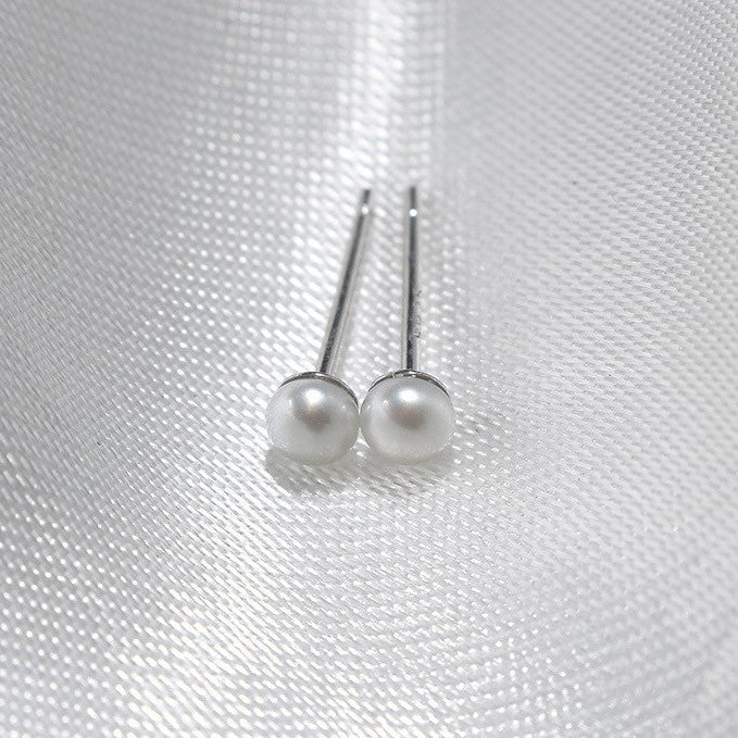 Pendientes Perla Miniatura en Plata 999 – Estilo Clásico y Elegante