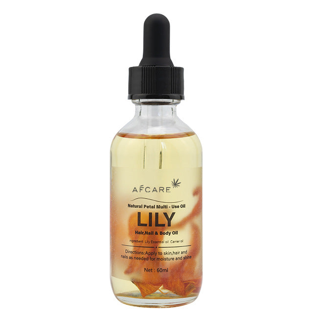 Aceite esencial de lirio con pétalos naturales, perfecto para cuidado corporal, hidratación intensa y uso en aromaterapia.